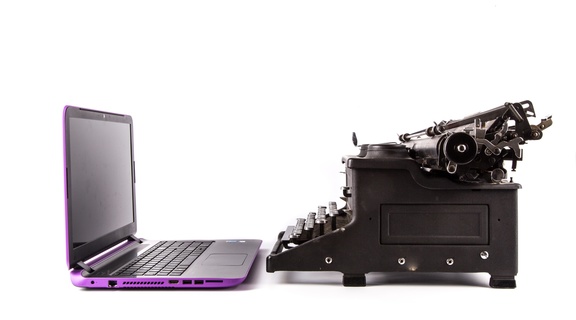 Homepage typewriter and laptop